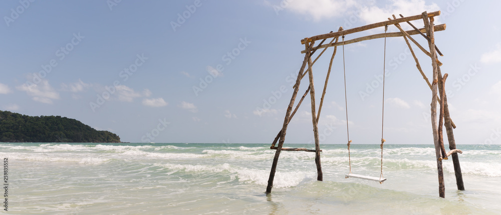 Big swing in the shallow waters of Sao Beach