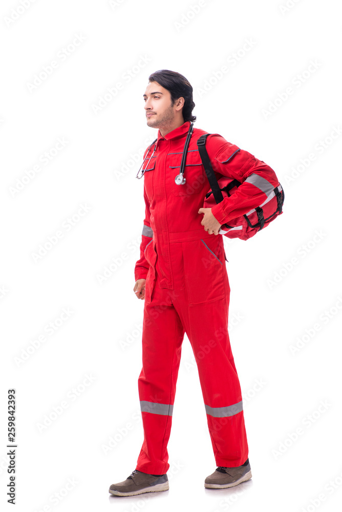 Young paramedic in red uniform isolated on white Young paramedic in red uniform isolated on white