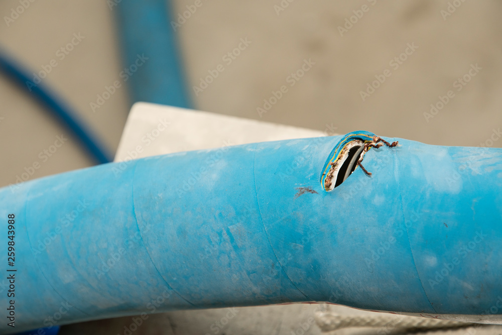 Obraz premium Detail of cracks on pressure rubber hose.