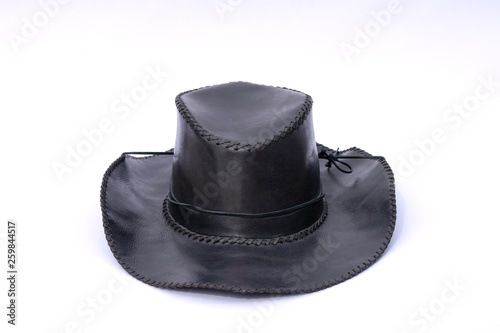 Black leather cowboy hat isolated on white background.