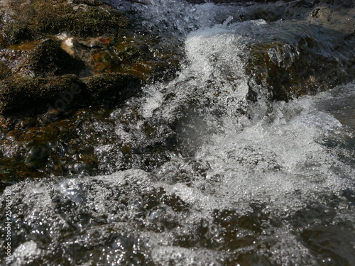 water flowing over rocks © hoshi