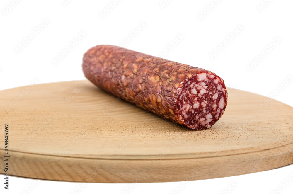 smoked sausage on a wooden board and on a white background smoked sausage on a wooden board and on a white background