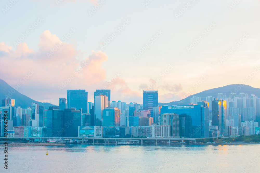 Naklejka premium Hong Kong city skyline, China at sunrise