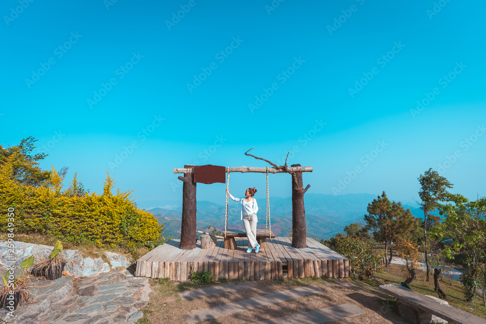 woman in holiday posing relaxing and freedom in outdoor nature on mountain with blue sky and sunlight by concept relax in vacation and holiday travel woman in holiday posing relaxing and freedom in outdoor nature on mountain with blue sky and sunlight by concept relax in vacation and holiday travel