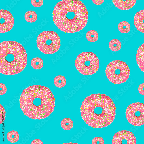 Pink donuts on green background seamless pattern