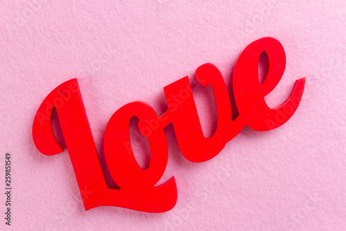 Love text on pink background
