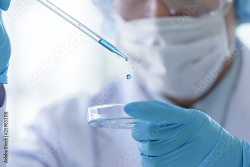 Asian senior scientist male researching and learning in a laboratory.