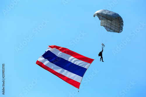 Soldiers show parachuting to allow children to watch on National Children's Day.