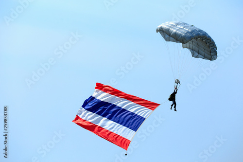 Soldiers show parachuting to allow children to watch on National Children's Day.