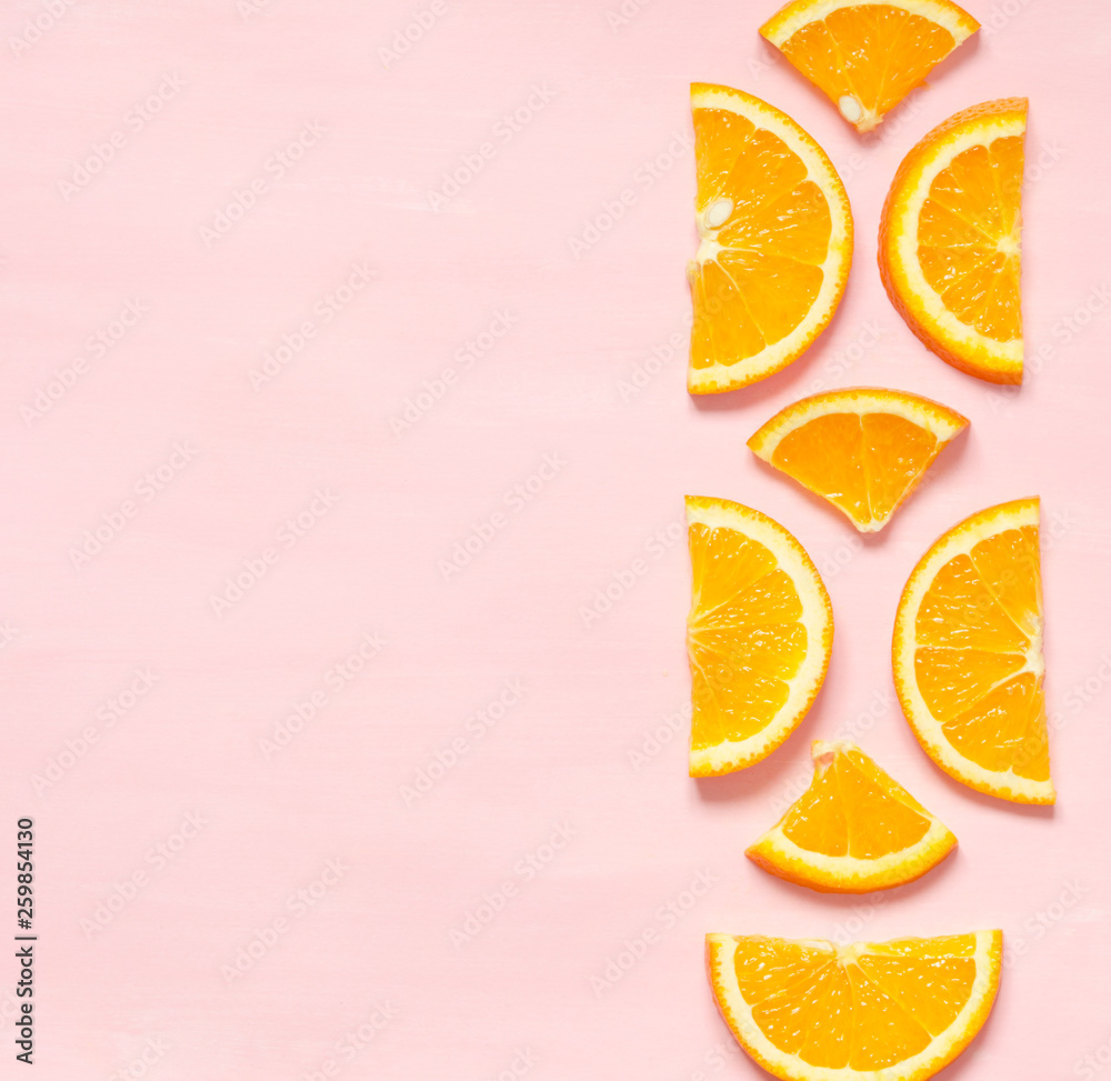 Fruit pattern of fresh orange slices on pastel background. Top view. Copy space. - Image Fruit pattern of fresh orange slices on pastel background. Top view. Copy space. - Image