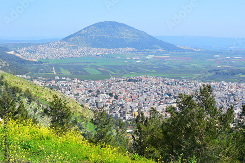 Canvastavla view of the Jezreel Valley, biblical Mount Tabor and the Arab villages at its fo