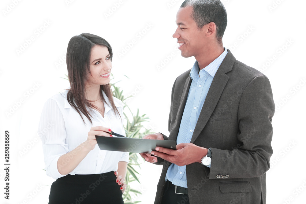 businessman and business woman discussing the terms of the contract businessman and business woman discussing the terms of the contract