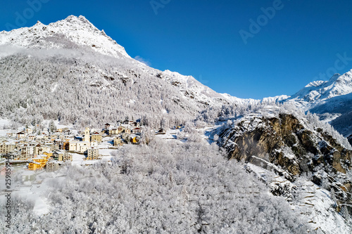 Primolo - Valmalenco (IT) - Vista aerea invernale con neve fresca photo