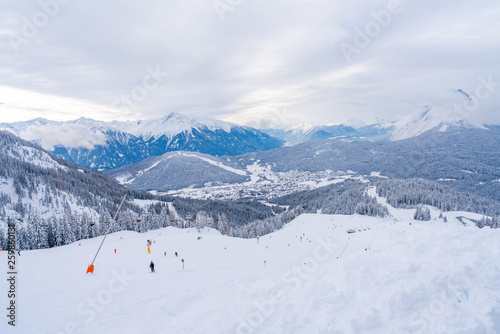 Winter landscape with snow covered Alps, ski slopes and aerial view of Seefeld in the Austrian state of Tyrol. Winter in Austria © beataaldridge