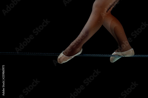 Canvas Print circus equilibrist steel wire artist isolated on black