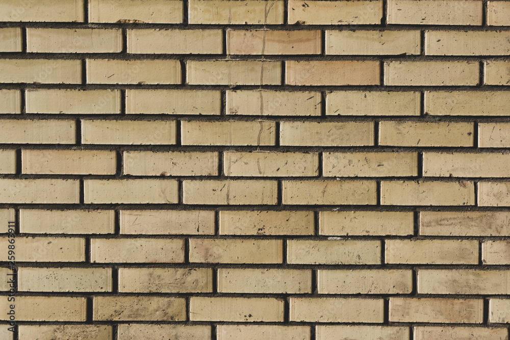 Fototapeta premium yellow brick wall texture background
