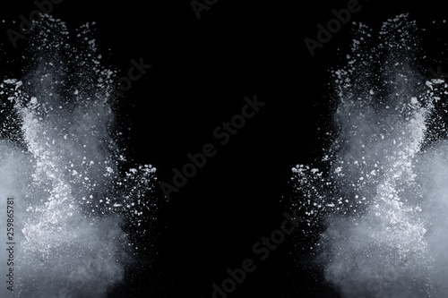 Fototapeta Naklejka Na Ścianę i Meble -  abstract powder splatted background,Freeze motion of color powder exploding throwing color powder,color glitter texture on black background.