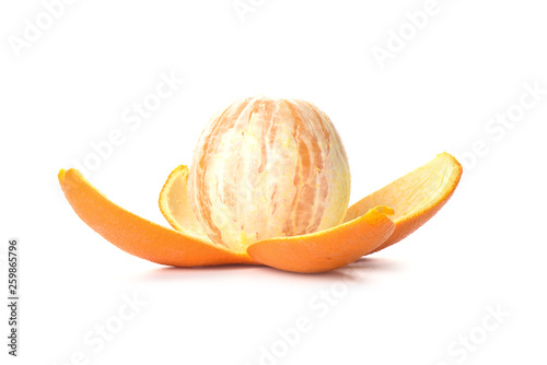 Peeled orange isolated on white background. Orange peel as petals.