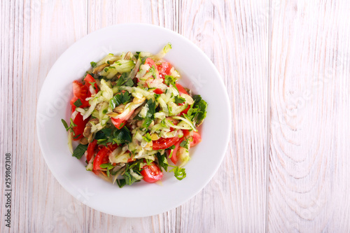 Fresh vegetable salad with cucumber, tomato