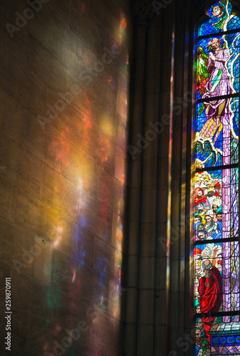 Colored stained glass windows in the old church of Prague