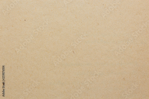 Texture of old brown paper, top view, close-up.