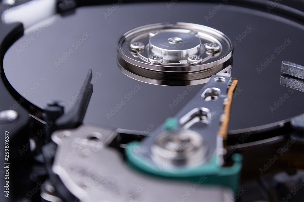 Open hard drive computer closeup. Detail of a computer. Open hard drive computer closeup. Detail of a computer.