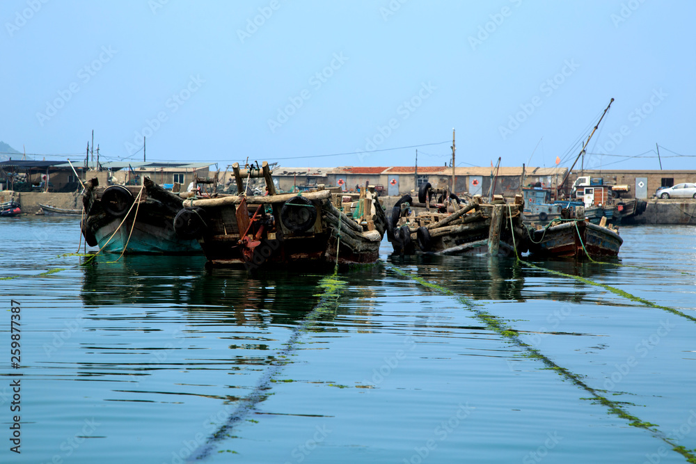 fishing boats on sea beach in China fishing boats on sea beach in China