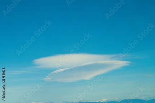 Cloud in disk shape with blue sky bacground