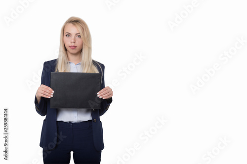 The blonde in the blue suit with the black folder. Isolated