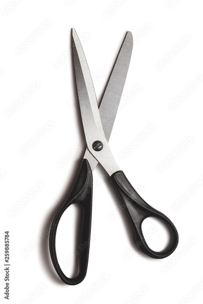metal tailor sewing scissors with black big and small rings on white background isolated with shadow metal tailor sewing scissors with black big and small rings on white background isolated with shadow