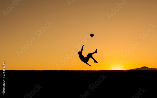 man playing unusual football © emerald_media