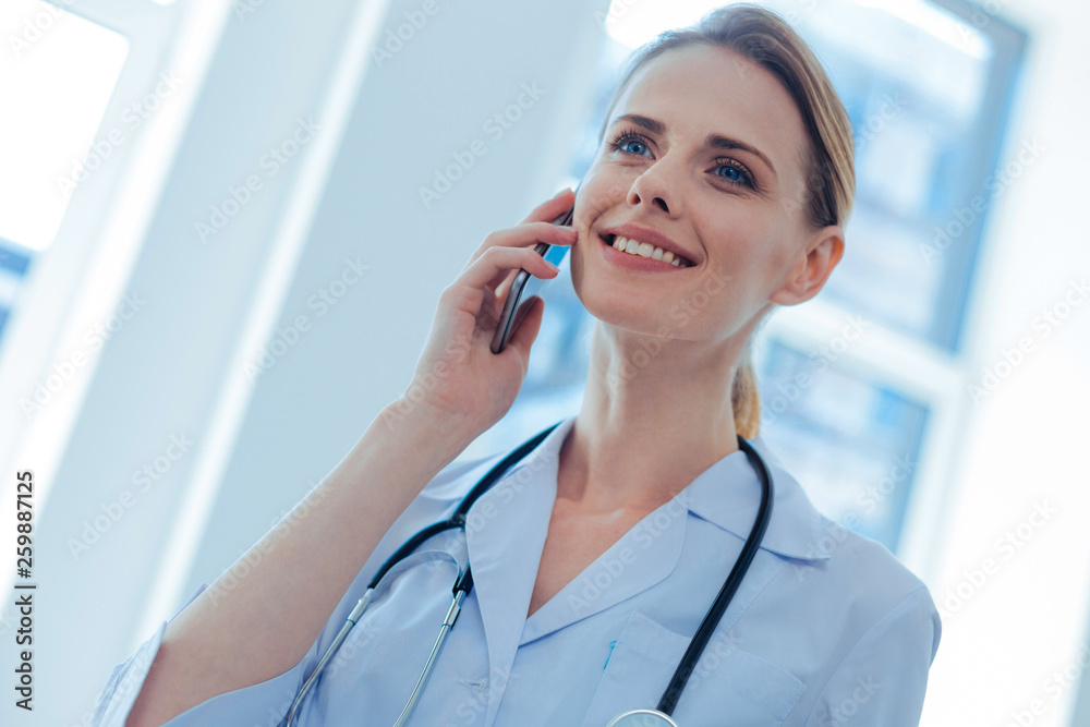 Portrait of positive woman that calling to her husband