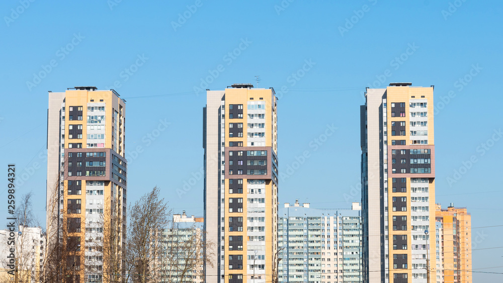urban landscape. high modern residential buildings against the blue sky