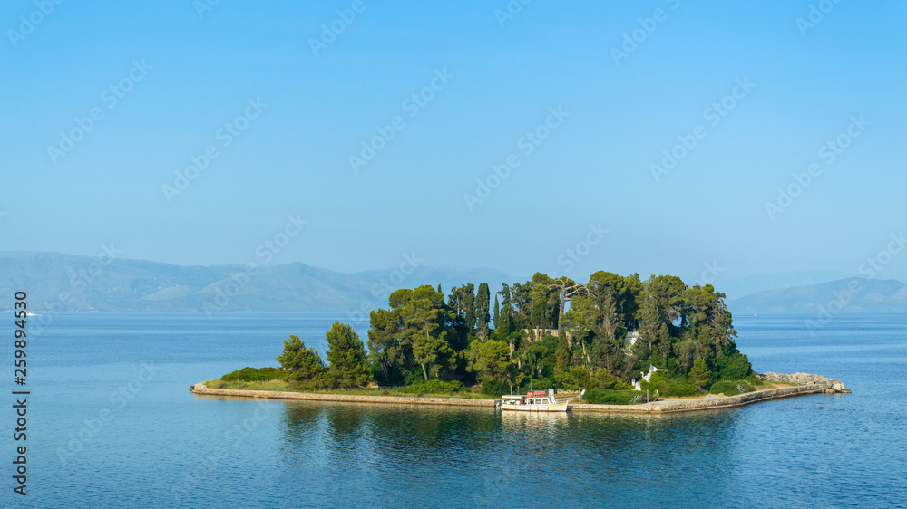 Corfu, Kerkyra view from the coast at the Pantokrator church on the island of Pontikonisi.