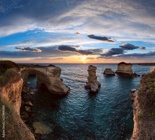 Fotografia Twilight Faraglioni at Torre Sant Andrea, Italy