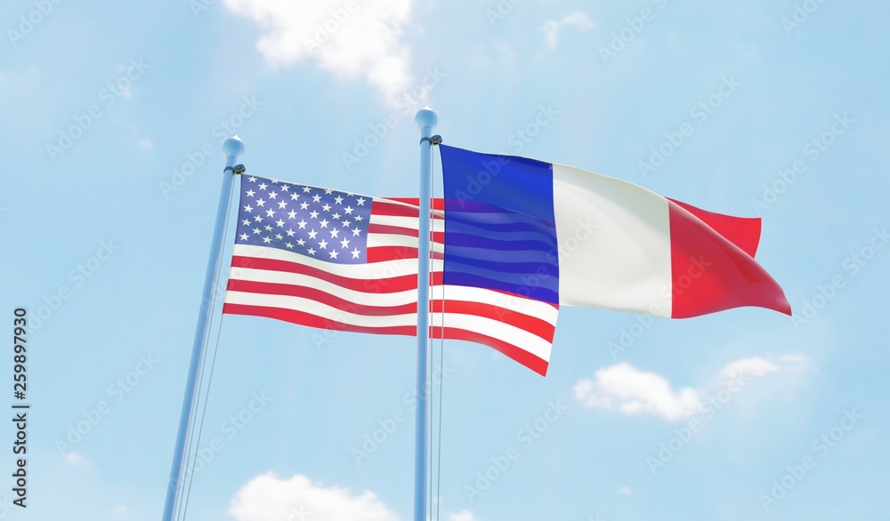 France and USA, two flags waving against blue sky. 3d image