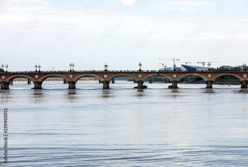 The Pont de Pierre bridge crossing the river Garonne, Bordeaux, France