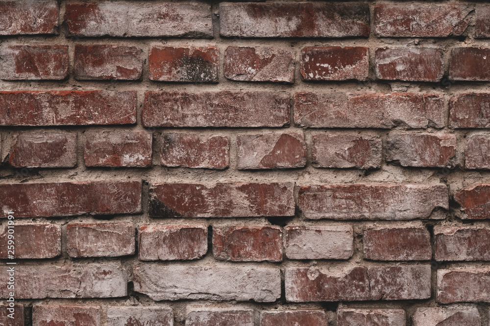 Old brick wall in white paint. Retro pattern of red bricks. Brown brick wall in whitewash. Vintage house facade. Red brown brick wall texture grunge background. Old brick wall in white paint. Retro pattern of red bricks. Brown brick wall in whitewash. Vintage house facade. Red brown brick wall texture grunge background.