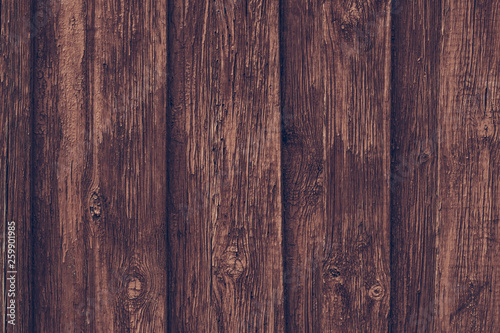 Rough unpolished wooden dark boards. Vintage oak table. Old brown wooden fence. Wood old plank vintage texture background.