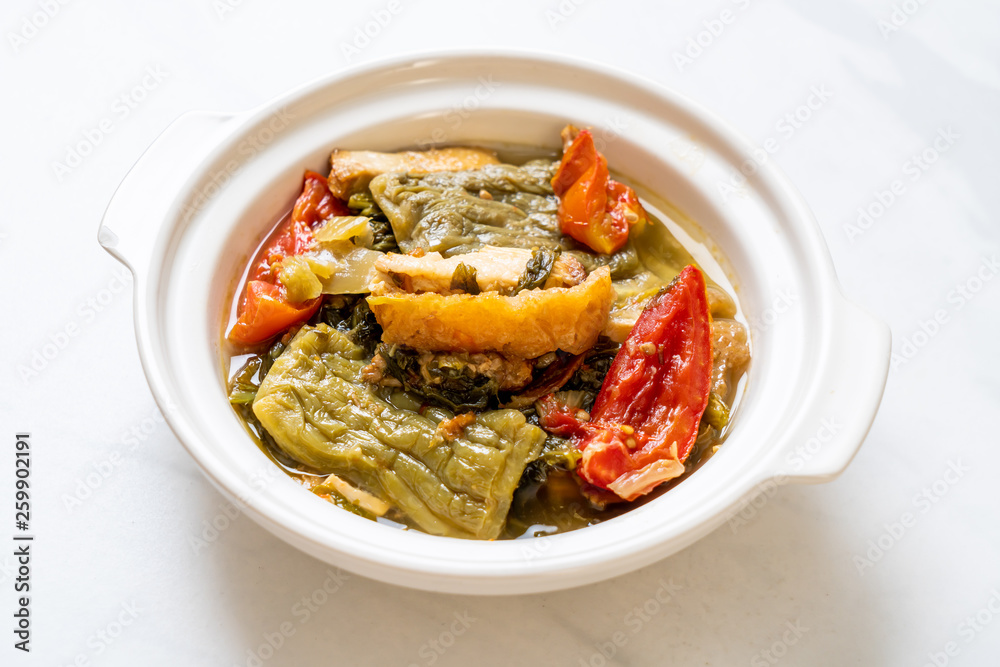 Bitter gourd and preserved mustard green soup with pork Bitter gourd and preserved mustard green soup with pork