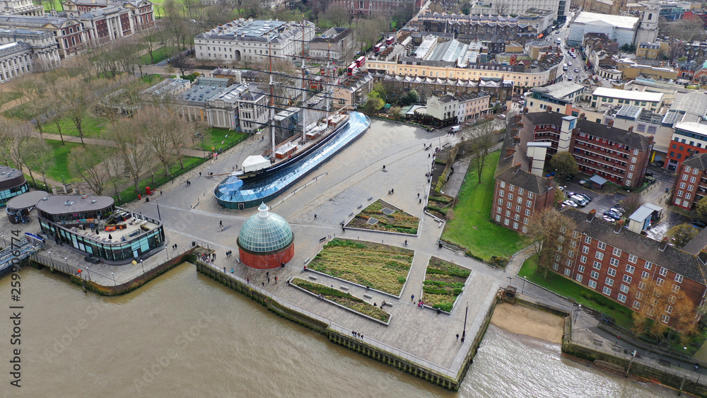 Aerial drone photo of famous Cutty Sark the only tea clipper survived and used as a museum next to Greenwich pier, London, United Kingdom