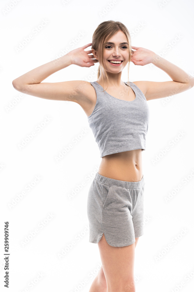 Young sporty Caucasian female model isolated on white background Young sporty Caucasian female model isolated on white background