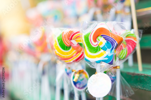 Multicolored lollipops on street food in Thailand