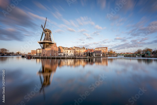 Windmill and traditional houses, Haarlem, Holland