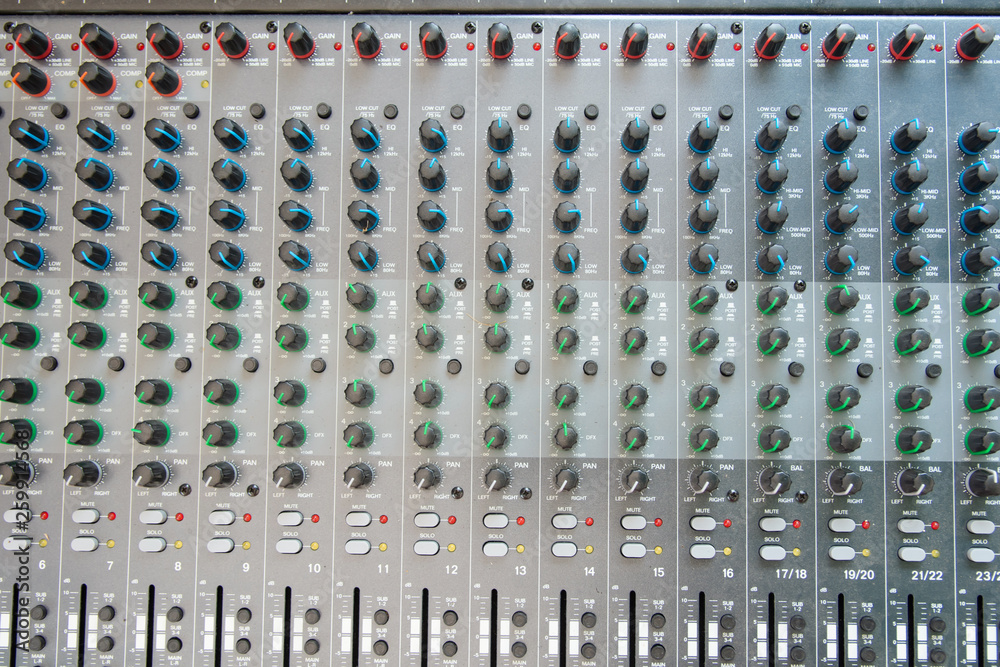 Audio sound mixer control panel top view.  Sound console buttons for adjust the volume