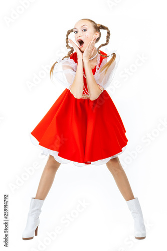 Photography Pretty young cheerful woman  with ridiculous  plaits in russian folk costume pos