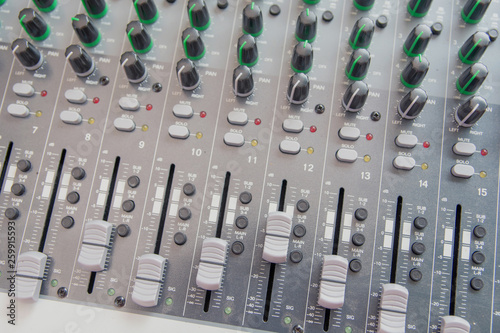 Audio sound mixer control panel.  Sound console buttons for adjust the volume