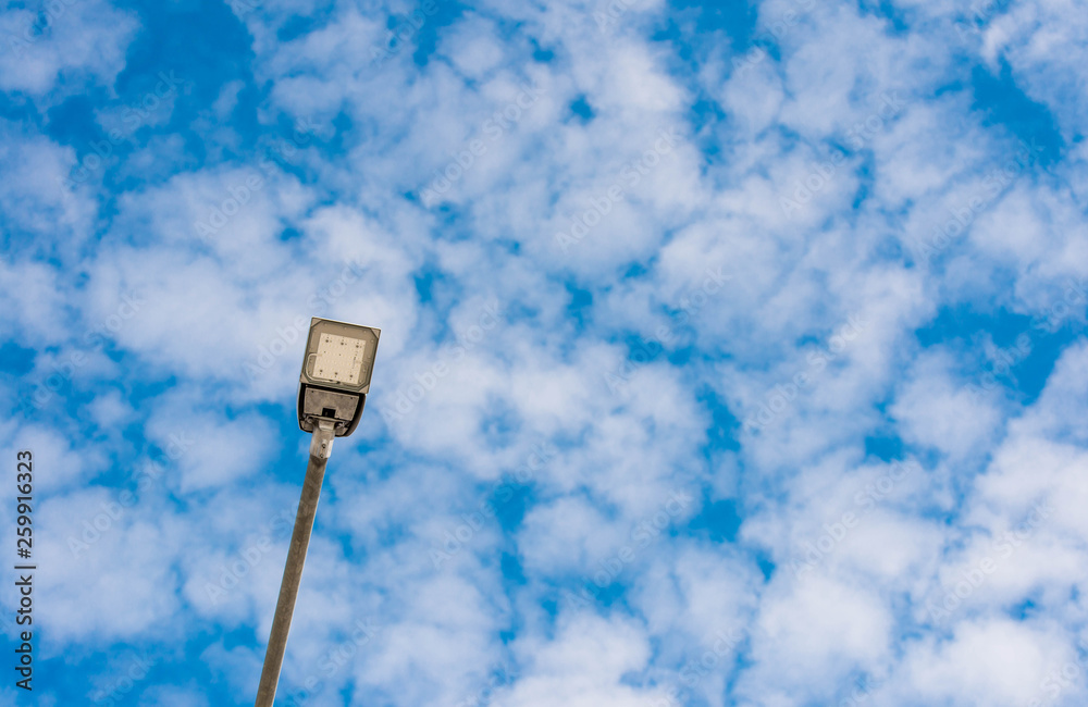 Led street light close up, blue sky with white clouds in the background, copy space. Led street light close up, blue sky with white clouds in the background, copy space.