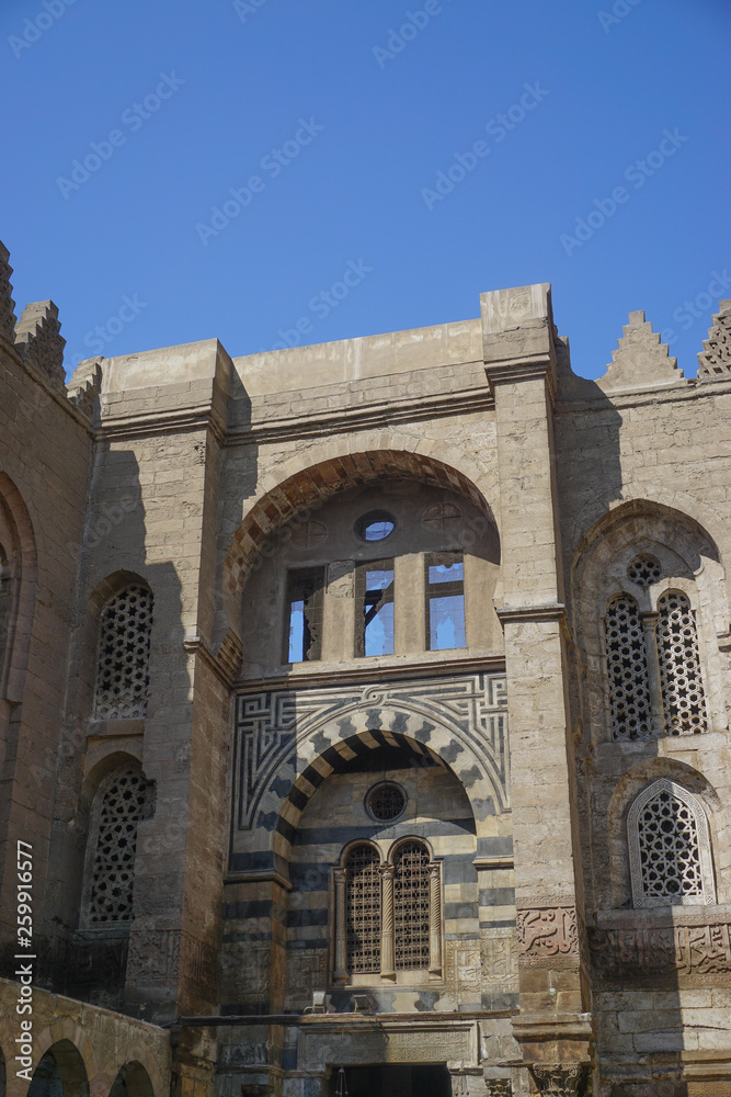 Fototapeta premium Cairo, Egypt: Detail of the Qalawun complex (c. 1285), on Muizz Street in the heart of Islamic Cairo District.