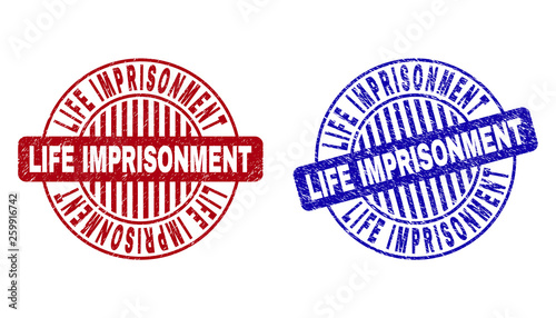 Grunge LIFE IMPRISONMENT round stamp seals isolated on a white background. Round seals with grunge texture in red and blue colors.
